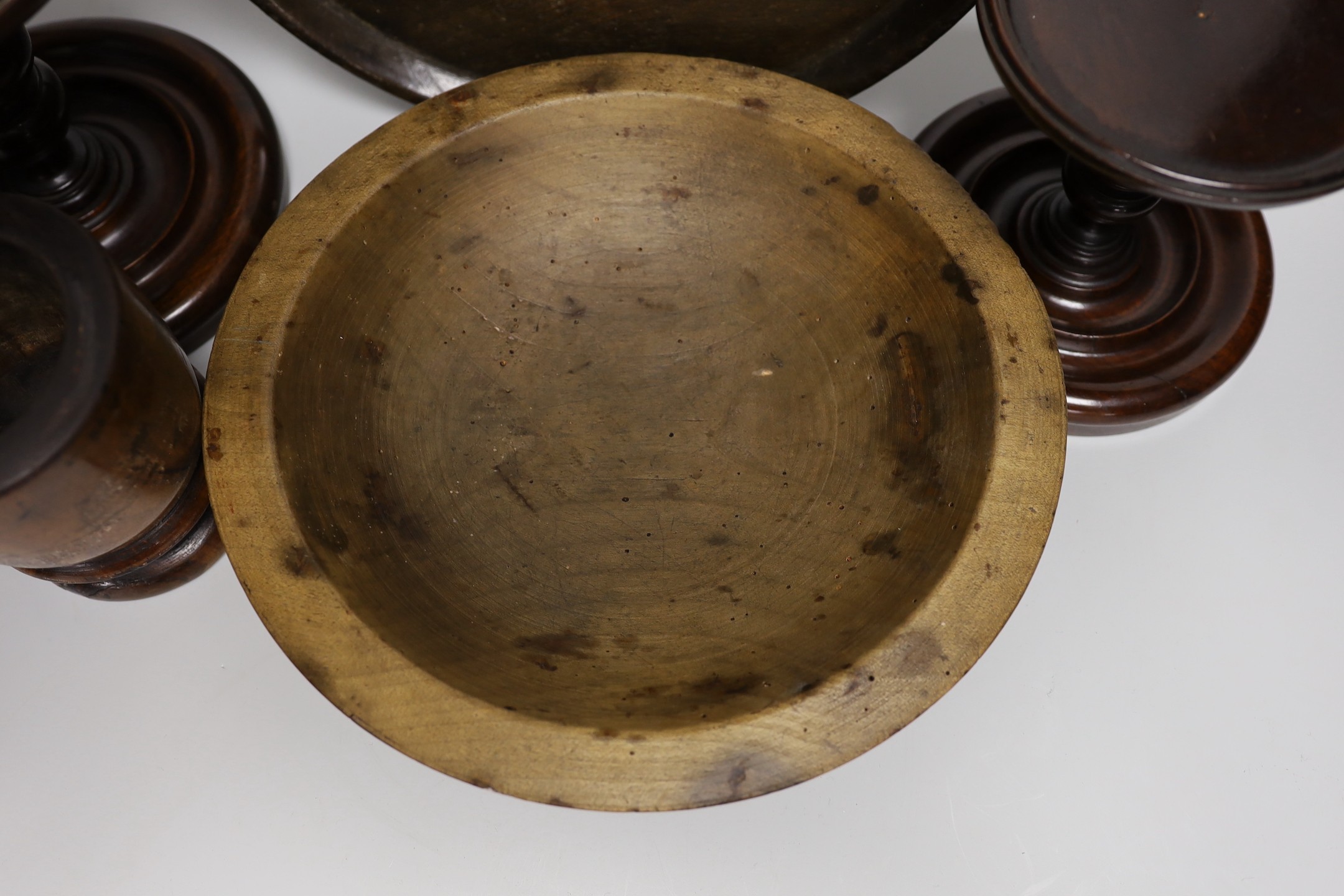 19th century and later treen including two mahogany candlestands, a spice tower and sycamore dish (6 in total)